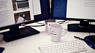 media professional desk with blog on screen