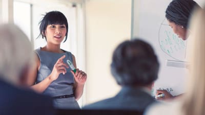 businesswoman giving a presentation