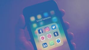hand cell phone social media apps
