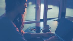 woman typing laptop