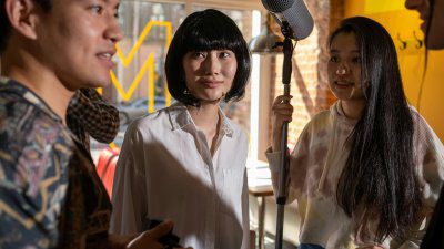 media professionals with a mic